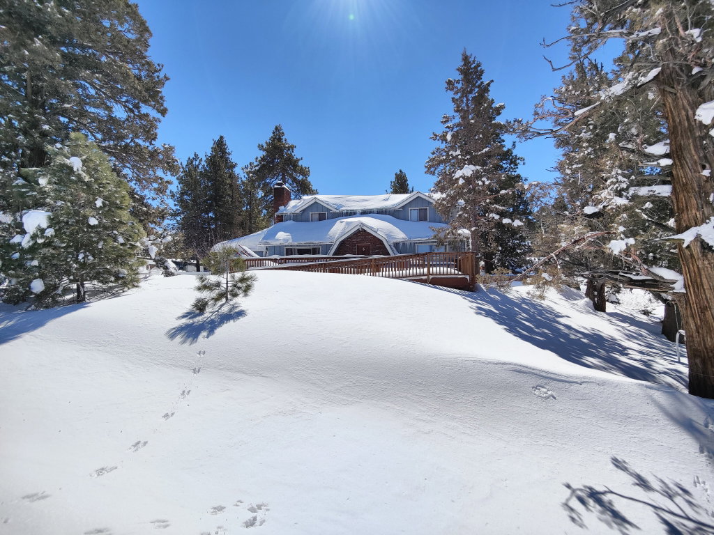 Main Building: Juniper Ridge Cabin After Winter Powder Snow