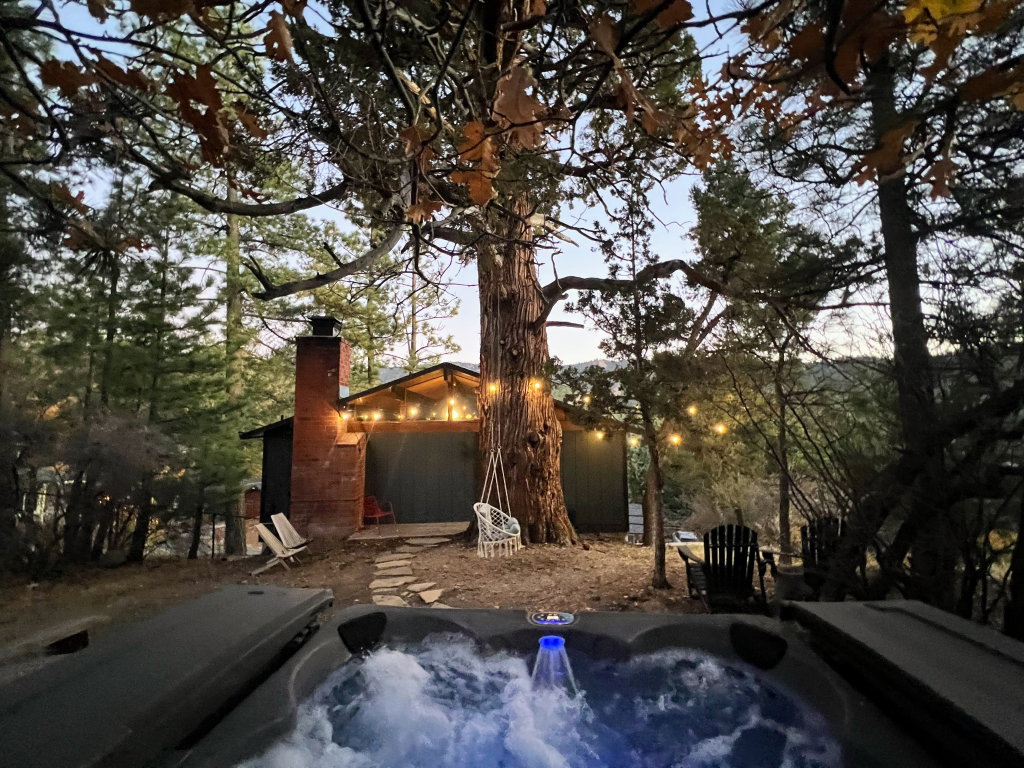 Hot tub in the trees to melt your troubles away