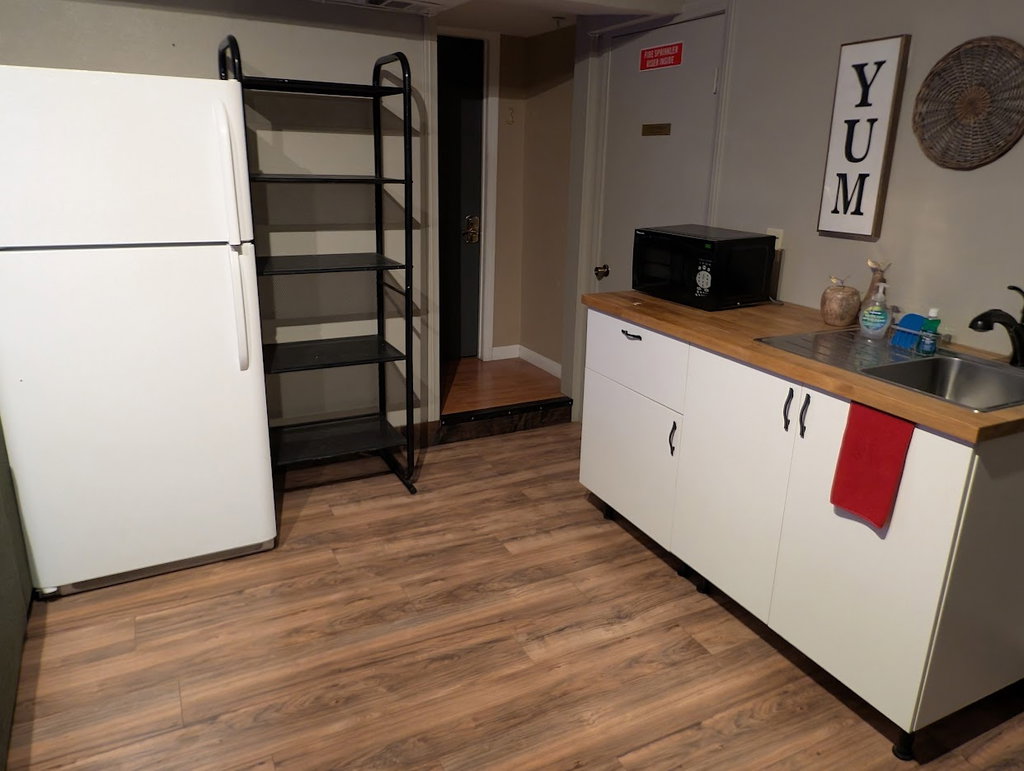 Kitchenette: 
No oven, range, burners, toaster
Yes Fridge/freezer, microwave, sink, dishes